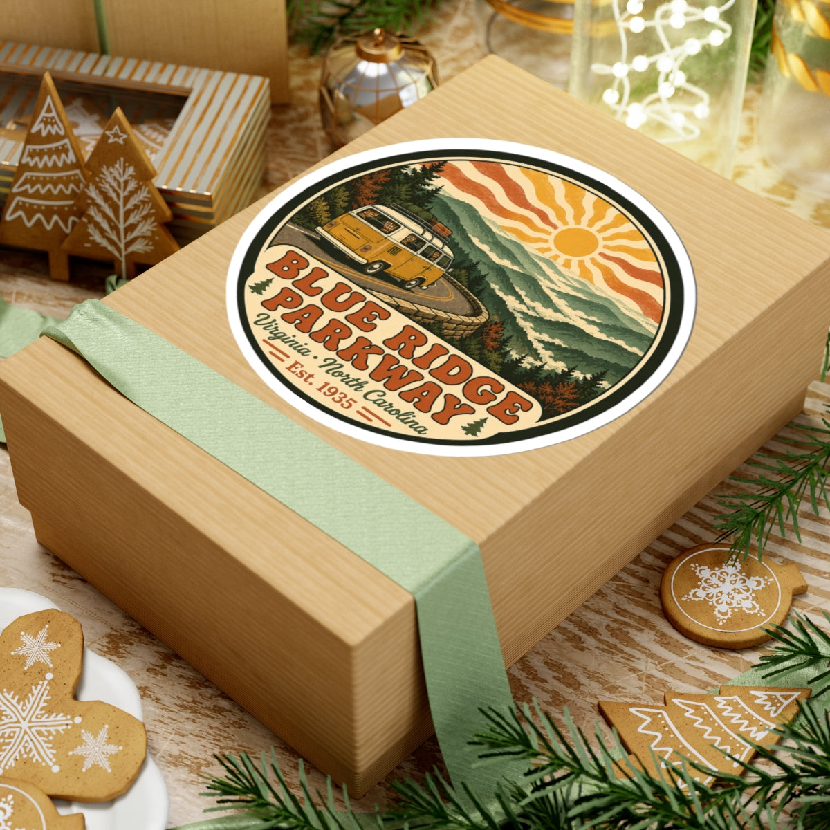 Round Blue Ridge Parkway sticker on gift box: yellow camper van, mountain scenery, sun and lettering