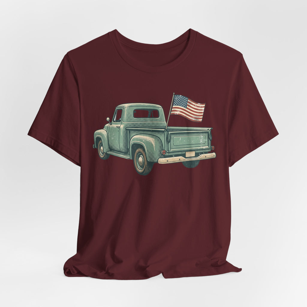 Maroon T-shirt with green pickup truck and small American flag graphic