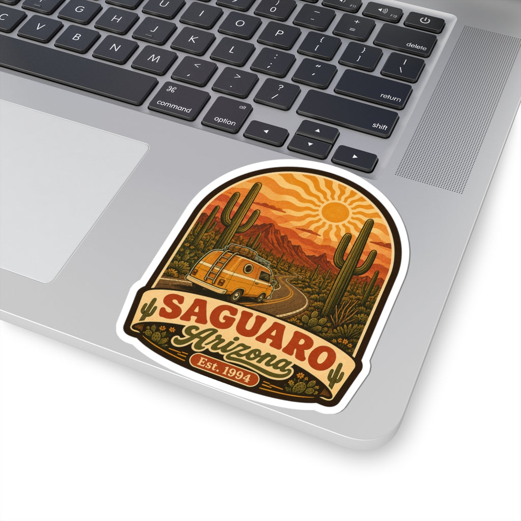 Saguaro Arizona arched sticker on laptop keyboard: desert cacti, yellow van, Est. 1994
