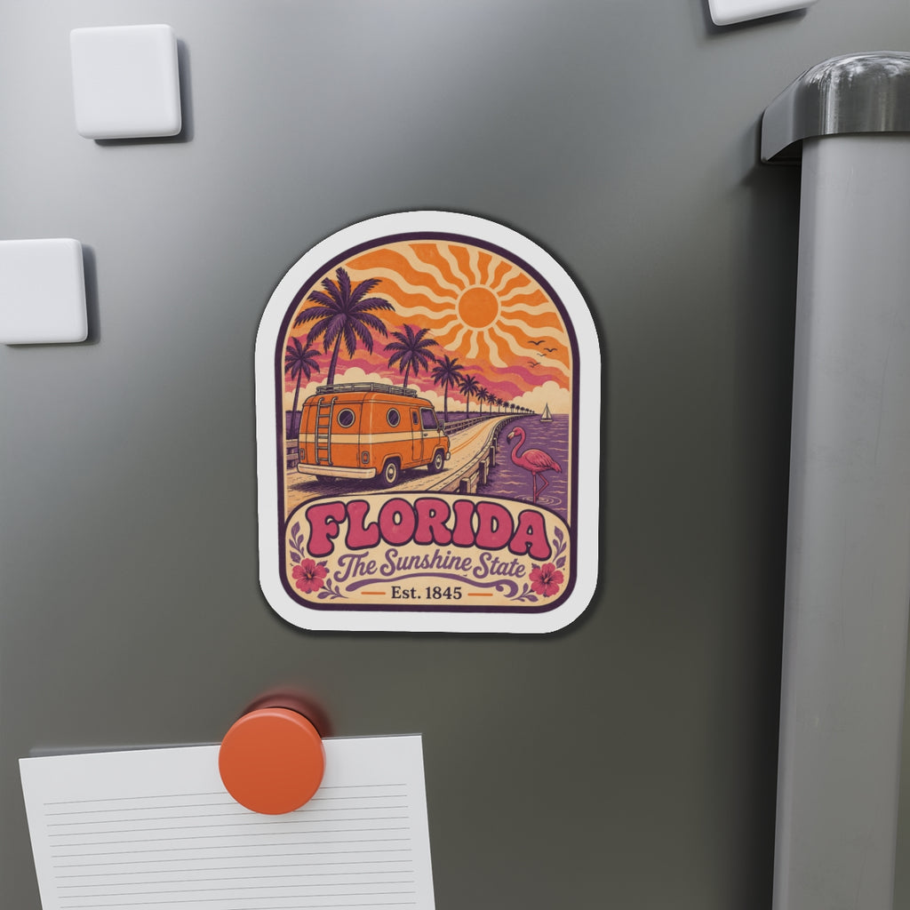 Florida die-cut magnet featuring retro van, palm trees, flamingo, and sunburst design