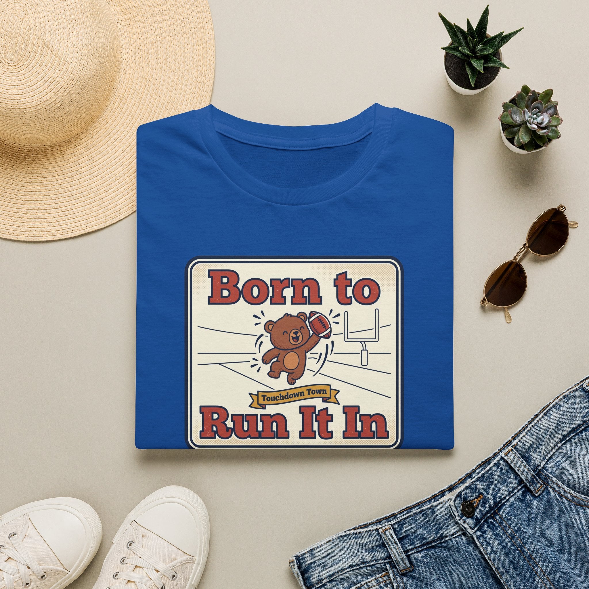 Blue crewneck T-shirt with “Born to Run It In” sports bear graphic