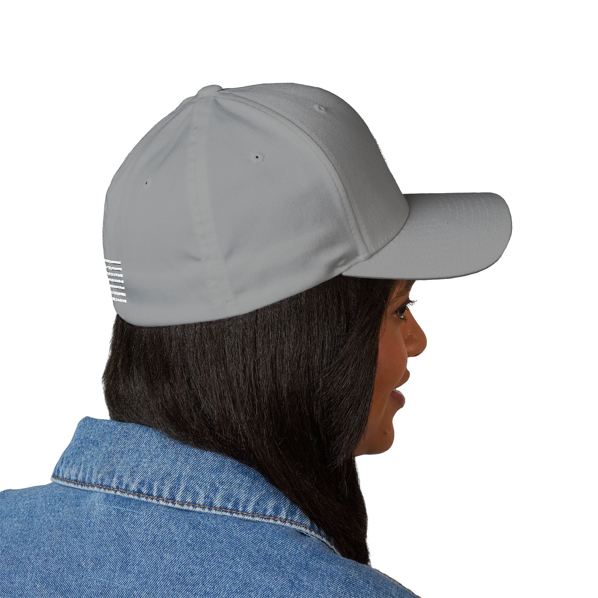 Embroidered baseball cap in light grey, side view with white stripes patch detail.