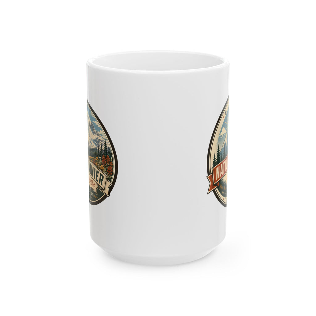 White ceramic mug with two-sided Mount Rainier national park emblem graphics