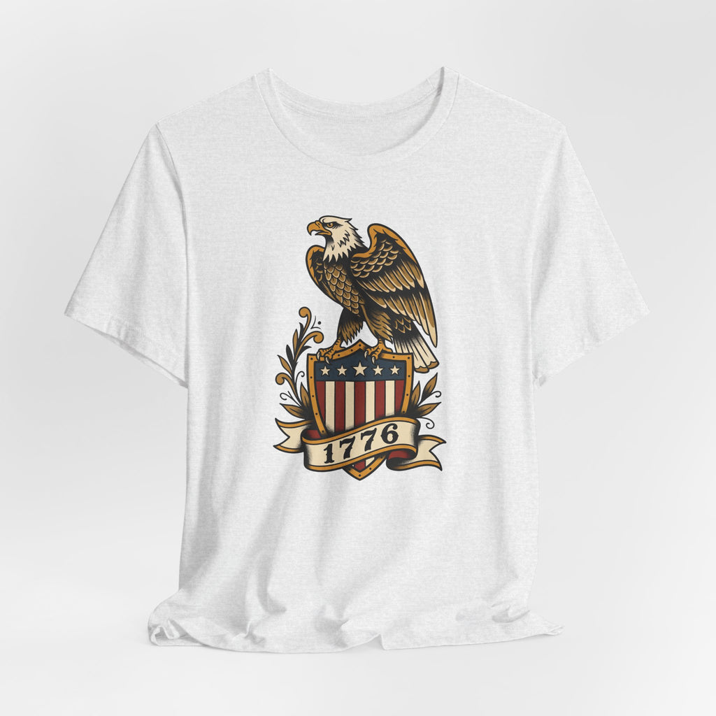 White crew-neck T-shirt with bald eagle shield graphic and banner reading 1776.