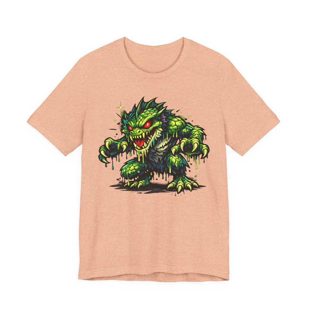 Light tan T-shirt with green swamp monster illustration graphic on front