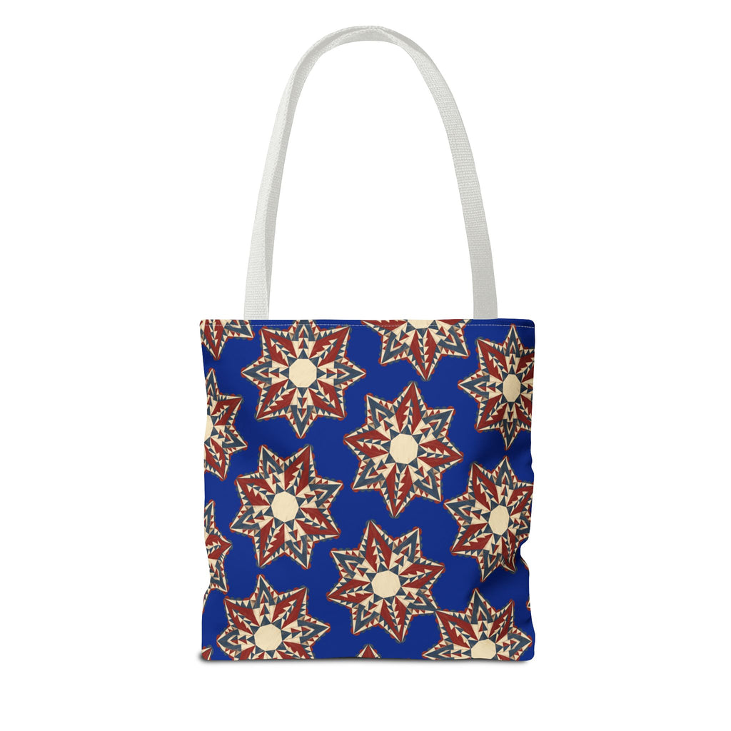 Blue starburst floral tote bag with white handles, square top-opening design