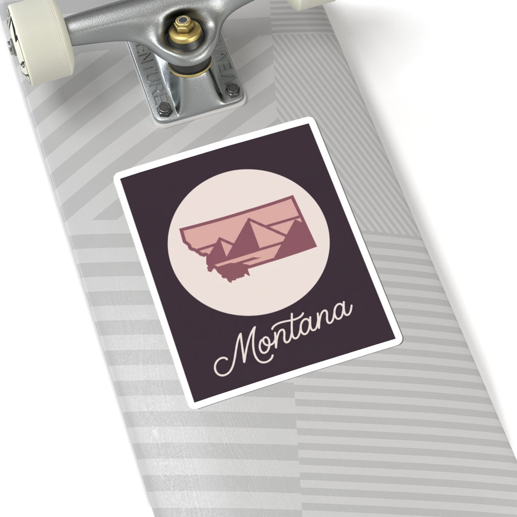 Montana state silhouette decal on travel surface with circular badge and “Montana”