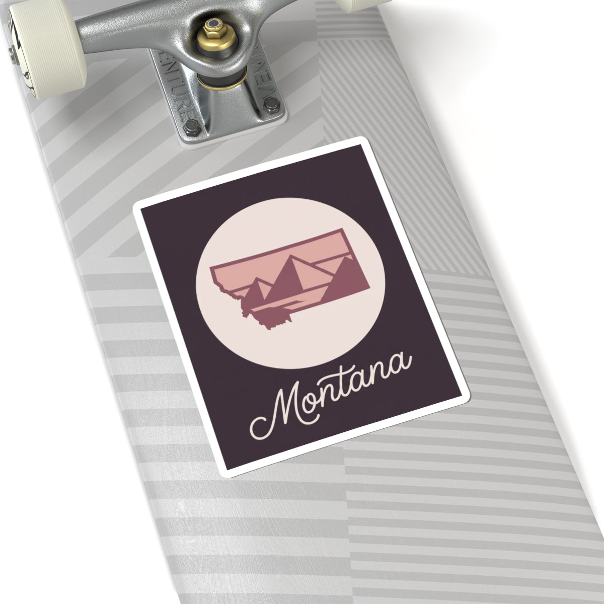Montana state silhouette decal on travel surface with circular badge and “Montana”