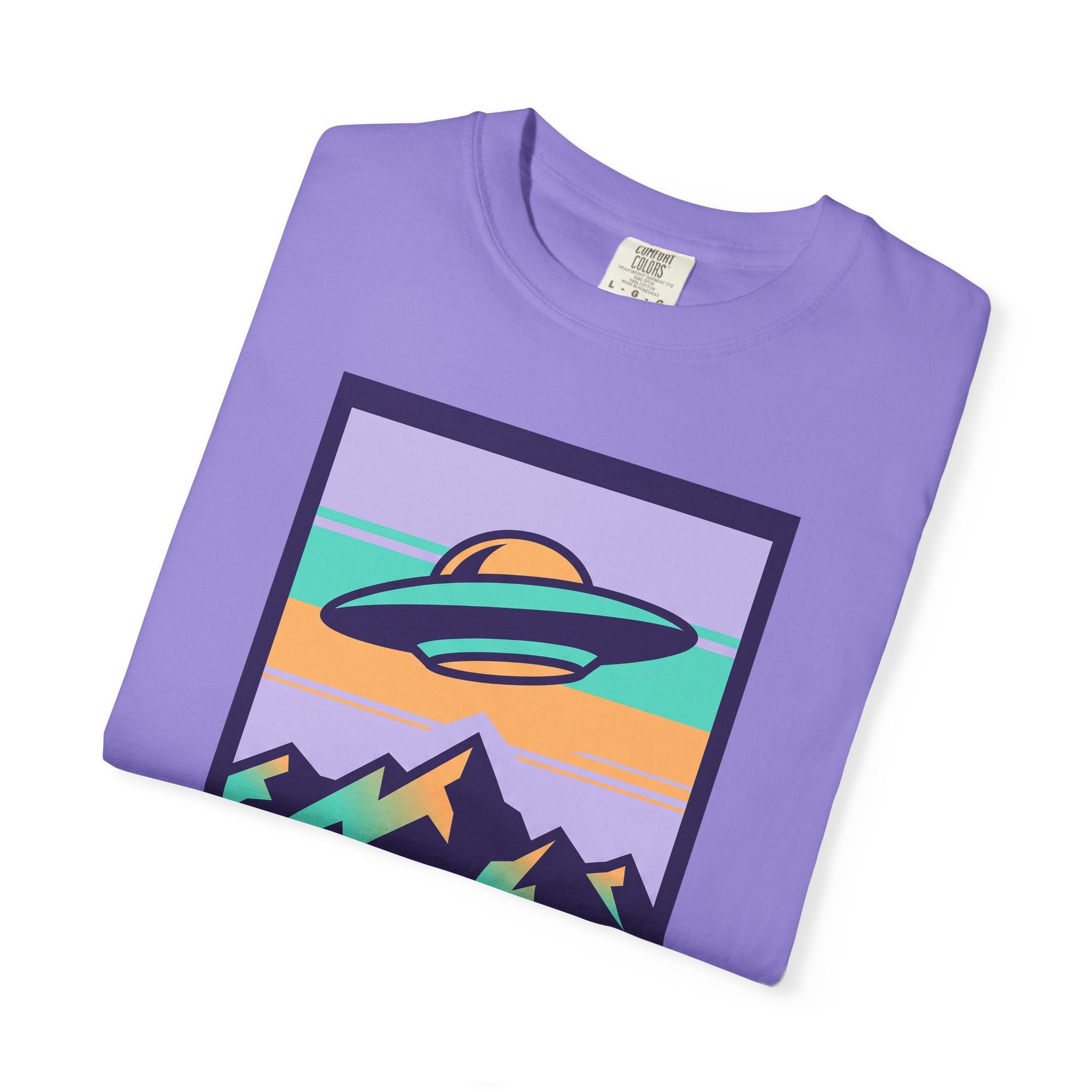 Lavender T-shirt with UFO and mountains 'Visit Earth' graphic