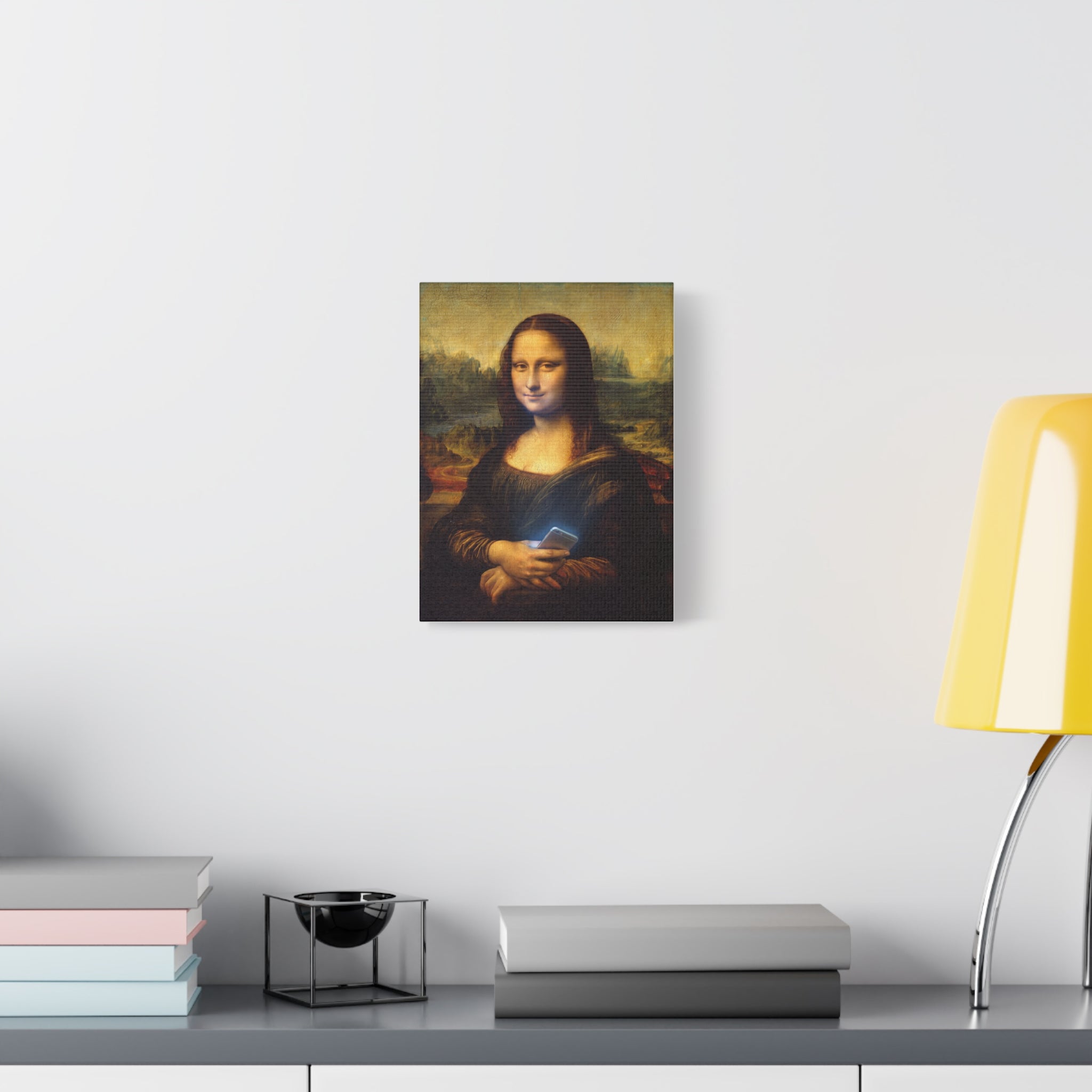 Small matte canvas wall art of Mona Lisa holding a glowing smartphone