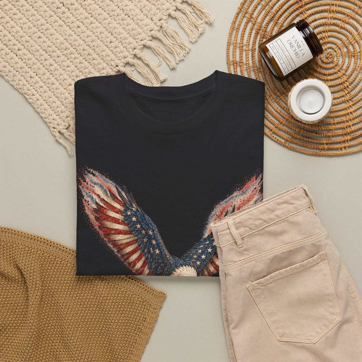 Black crew-neck t-shirt with colorful American flag eagle wing graphic, front.