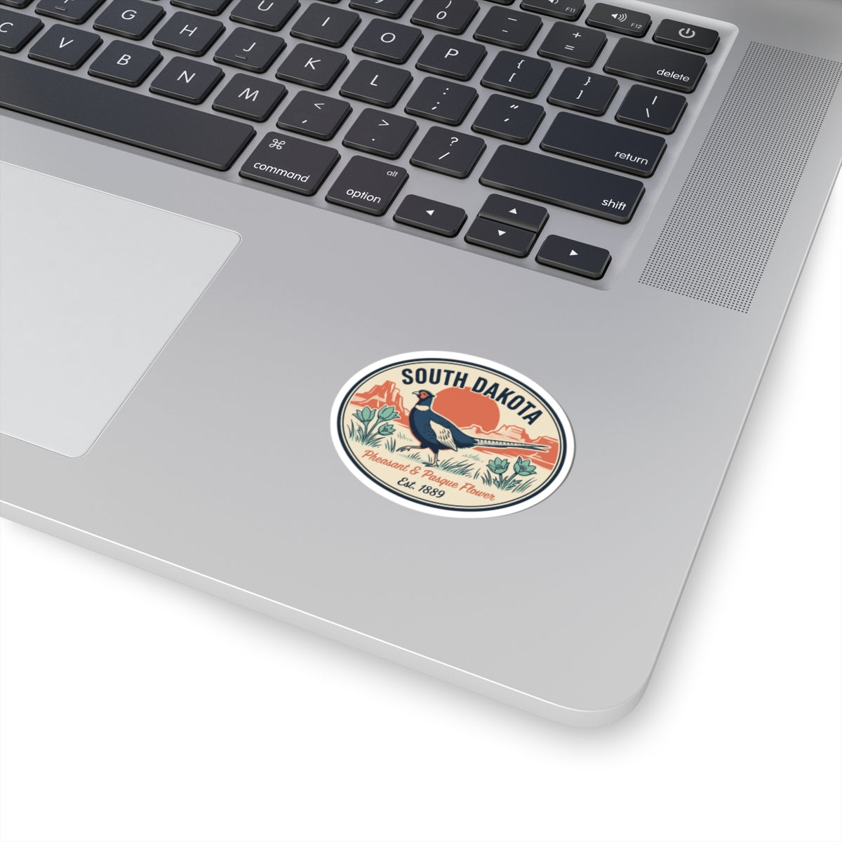 South Dakota pheasant and pasque flower vintage badge sticker on laptop