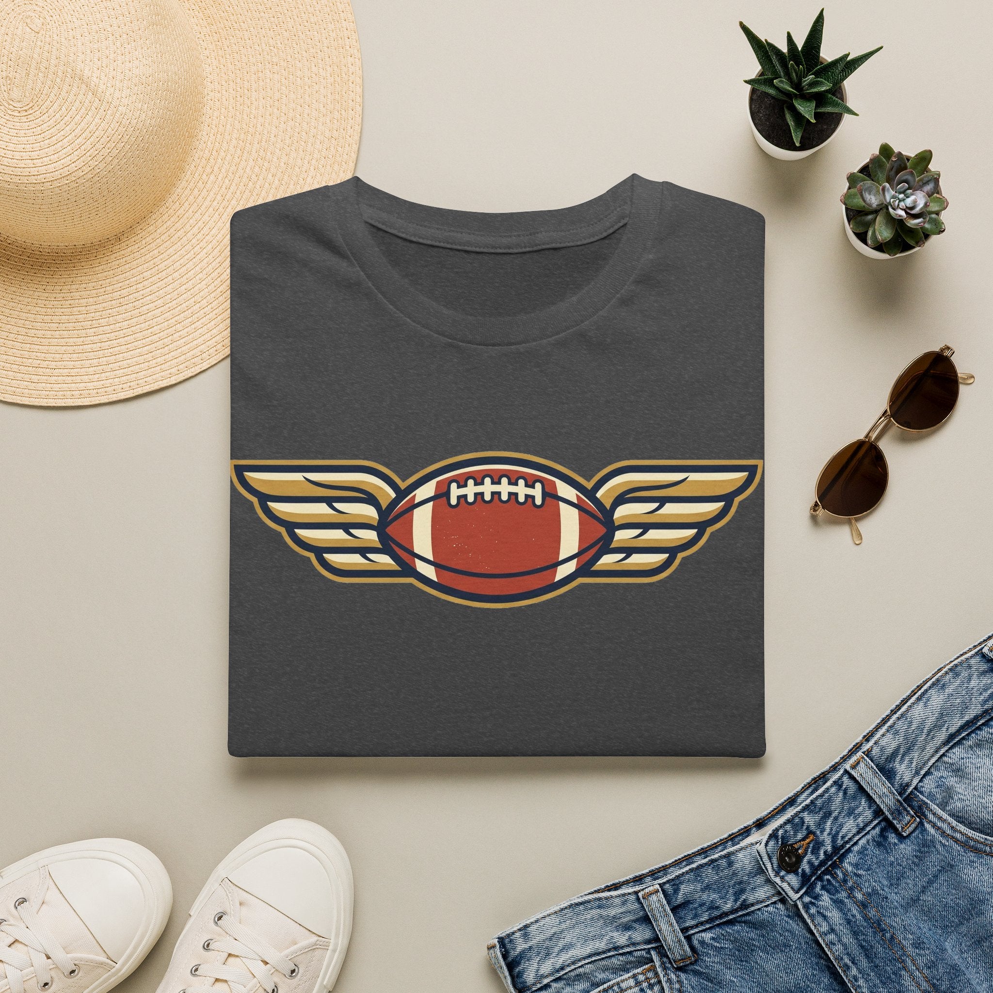 Dark charcoal crewneck t-shirt with winged football graphic on the chest