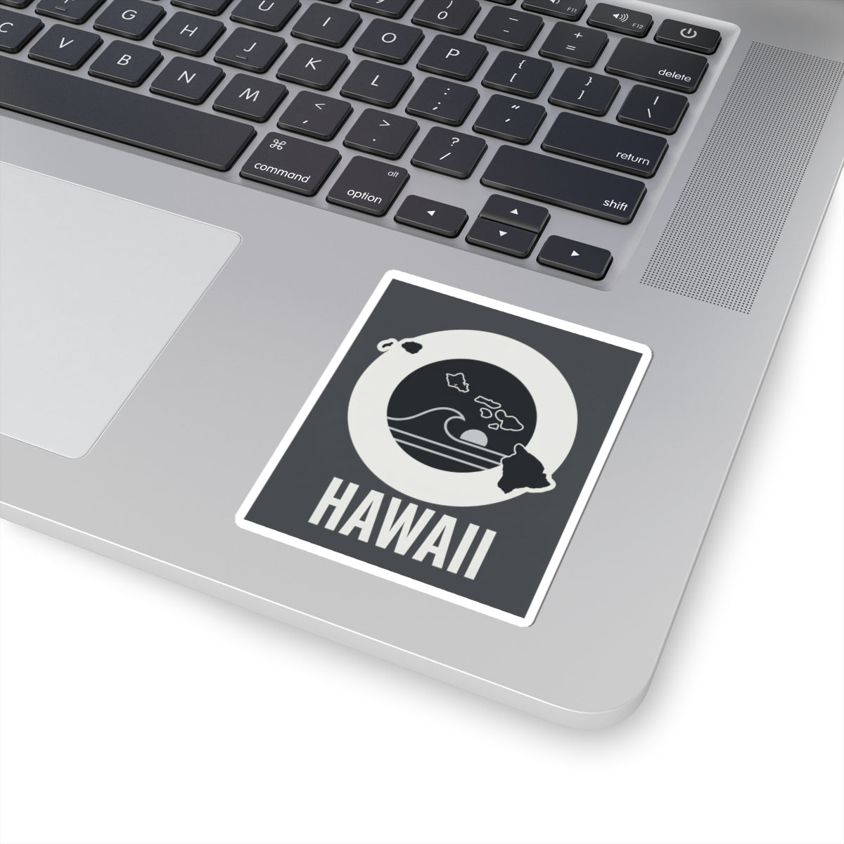 HAWAII square kiss-cut sticker on a laptop lid, black wave emblem with island silhouette