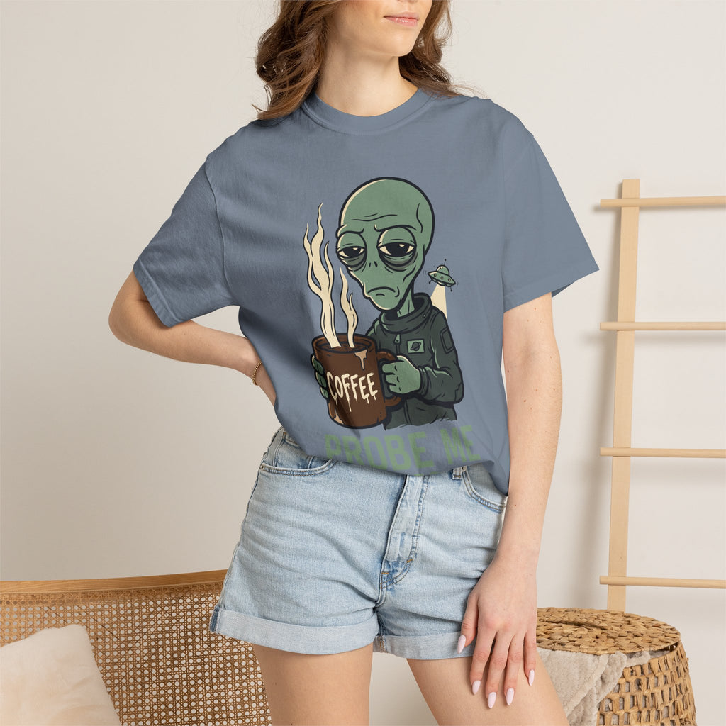 Blue alien coffee T-shirt worn by model, graphic of alien holding coffee