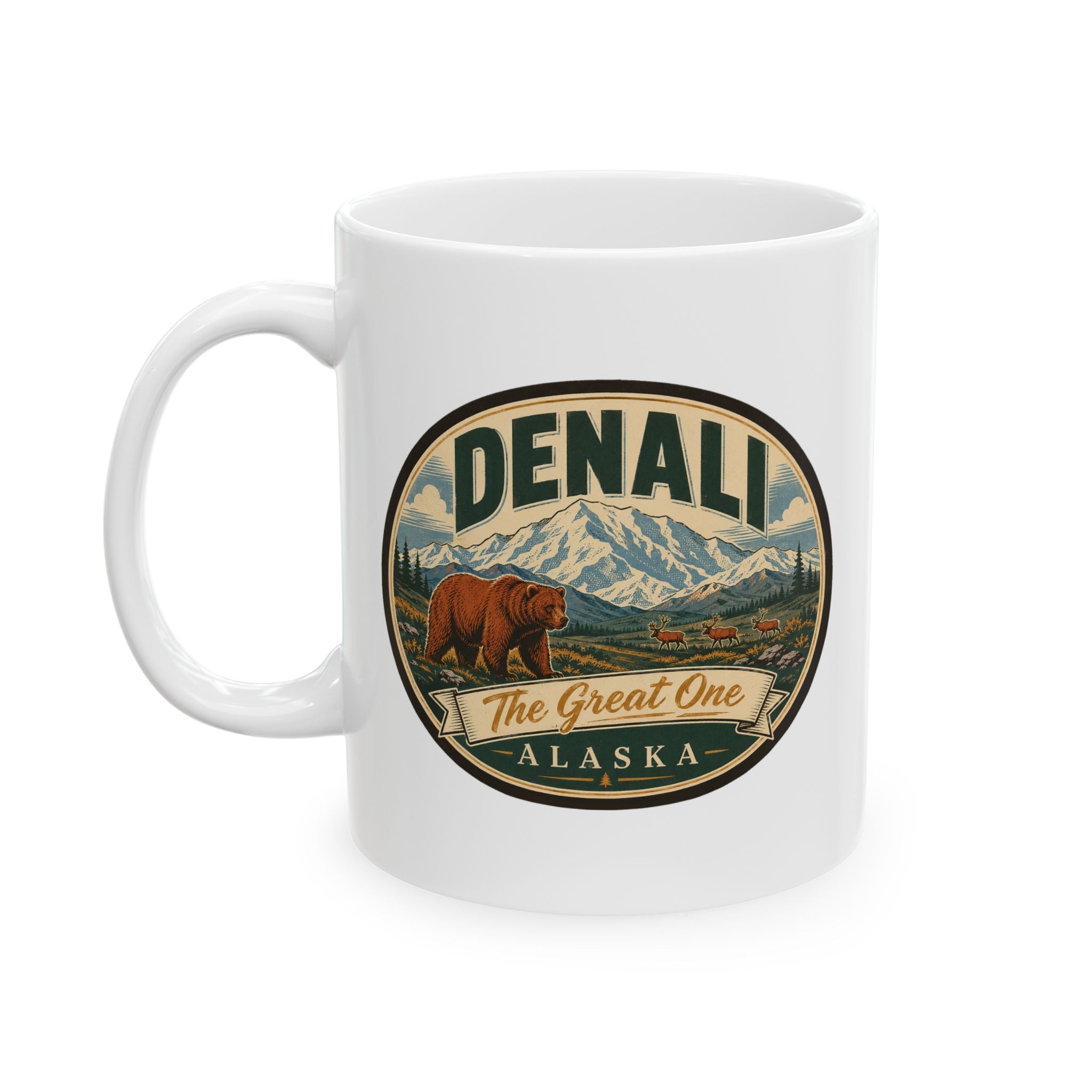 White ceramic mug with Denali The Great One Alaska badge graphic and side handle