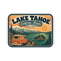 Kiss-cut sticker with Lake Tahoe lettering, trees, orange sun, and camper van illustration.