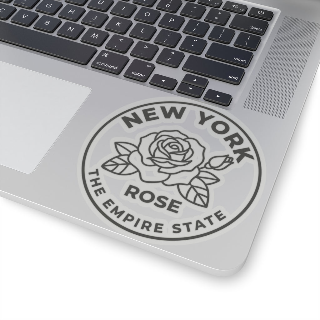 Circular gray rose state vinyl decal on laptop with “ROSE” and “THE EMPIRE STATE”