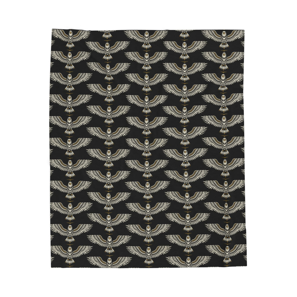 Velveteen plush blanket with winged skull pattern, dark base and gold accents
