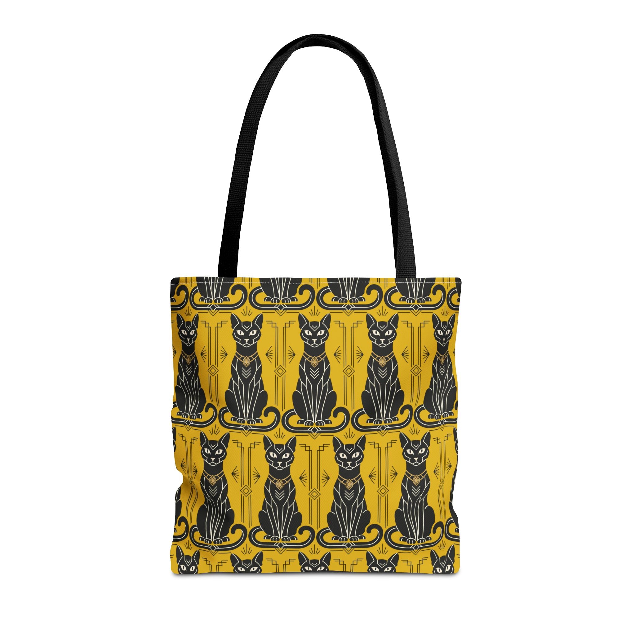Tote bag with repeating cat silhouettes in blue and black on yellow, black handles.