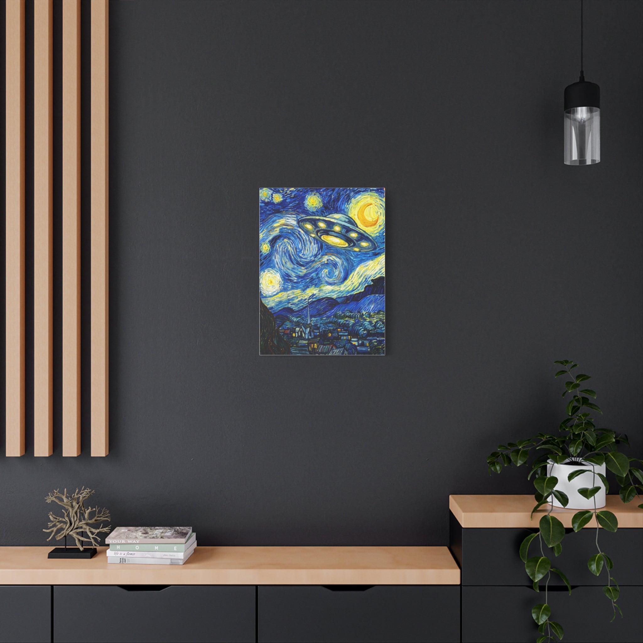 Starry blue-and-yellow UFO canvas on matte stretched backing, mounted on dark wall