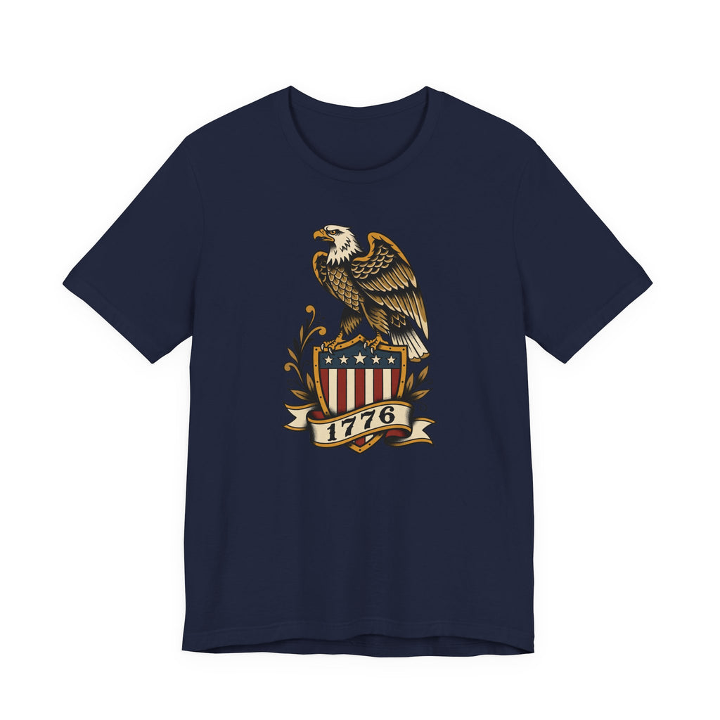 Graphic T-shirt, navy, front features gold eagle and 1776 shield logo.