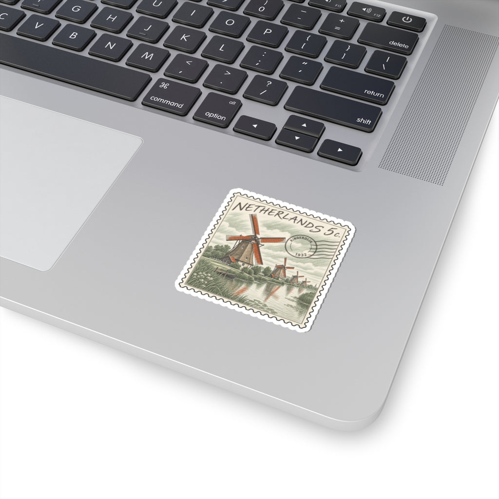 Stamp-style Netherlands 5c sticker with red windmill, canal scene, and scalloped edge