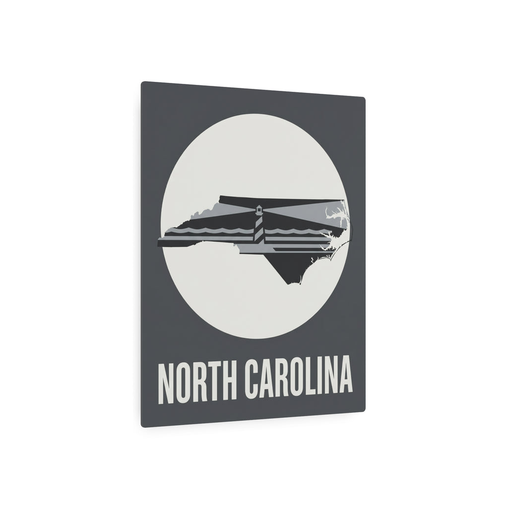 Square dark gray metal sign with North Carolina lighthouse graphic and “NORTH CAROLINA”