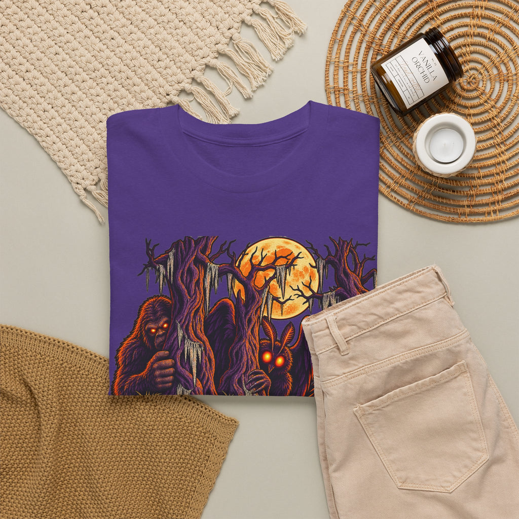 Purple crewneck t-shirt with monster, orange full-moon, and fiery graphic front