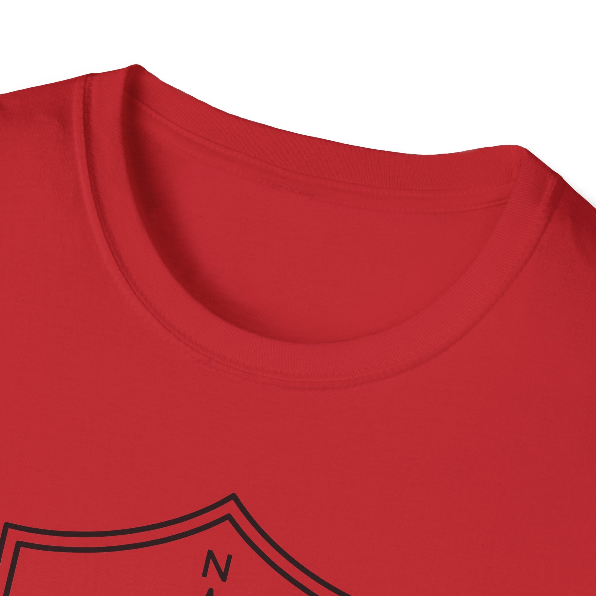 Red T-shirt crew neck close-up with graphic edge below.