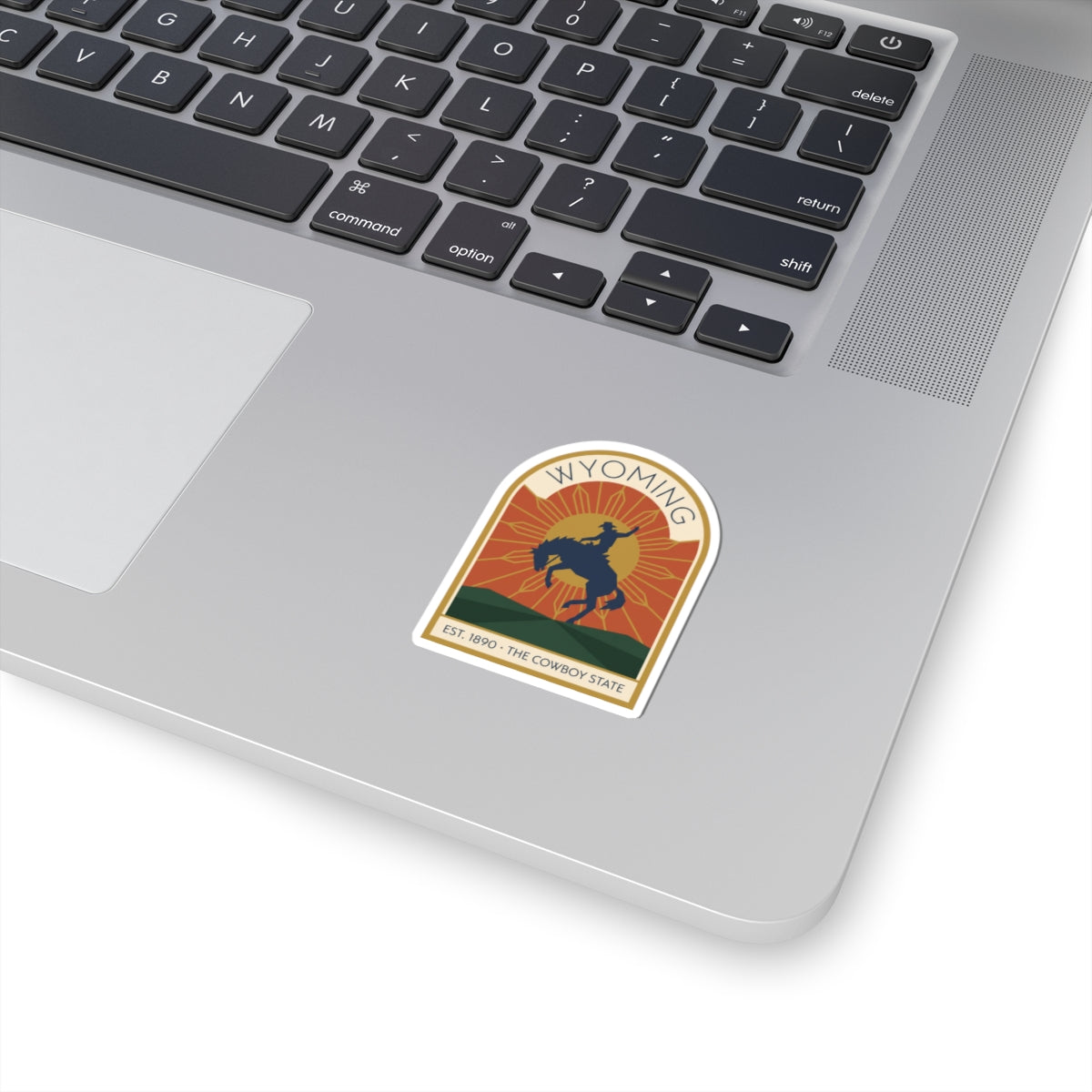 Cowboy state sticker with Wyoming bronco badge, white border, Est. 1890