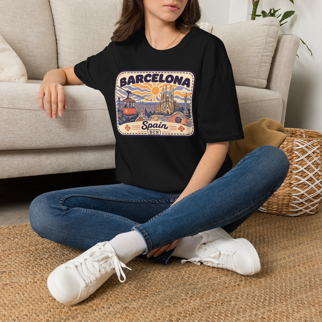 Black crewneck t-shirt with “BARCELONA Spain” skyline graphic, worn by a model