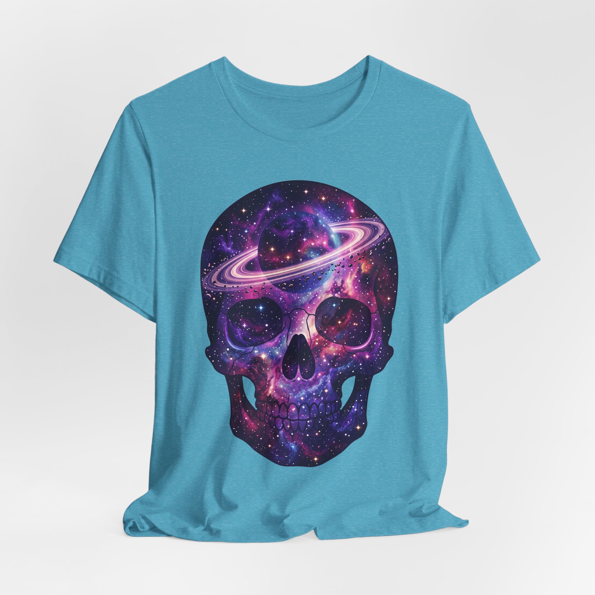 Galaxy skull T-shirt in heather aqua, purple cosmic skull with planet ring front graphic