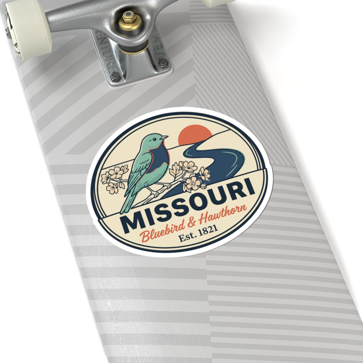 Round Missouri state badge sticker with teal bluebird, flowers, and “MISSOURI” across the center
