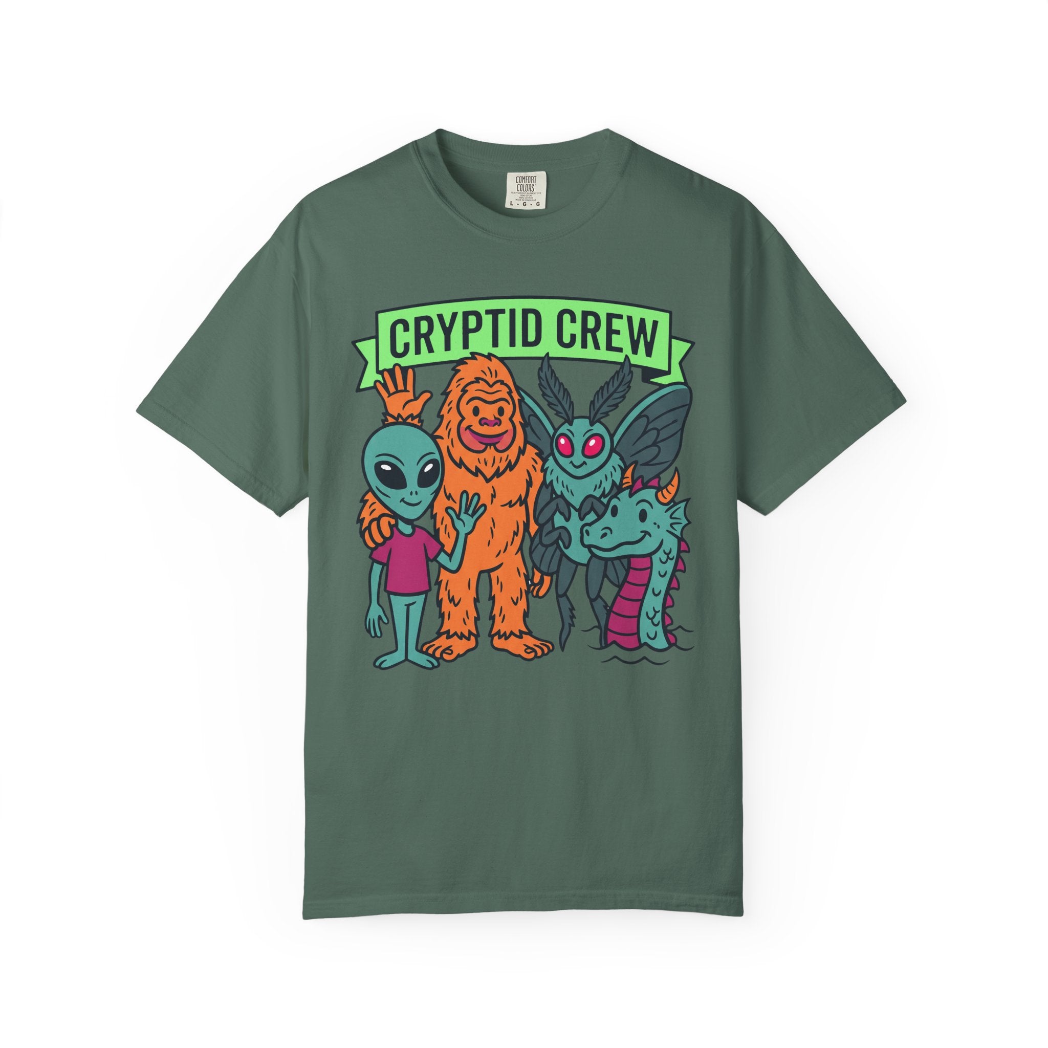 Green crew neck t-shirt with “CRYPTID CREW” cartoon cryptid group graphic