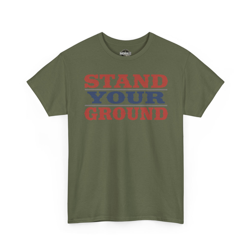 Military green T-shirt with bold vintage “STAND YOUR GROUND” text graphic on front