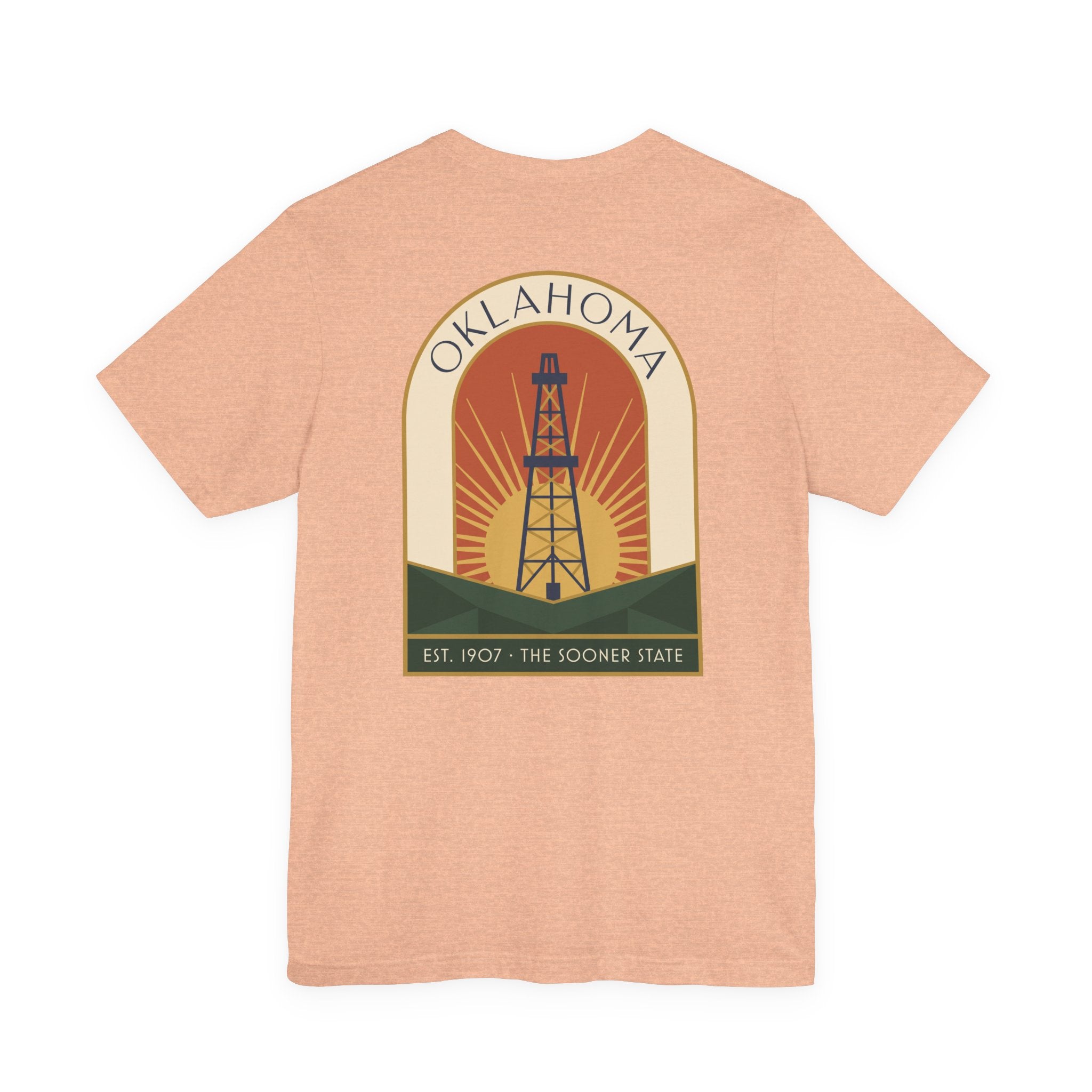 Heather peach T-shirt with large back oil derrick sunset graphic and Oklahoma text