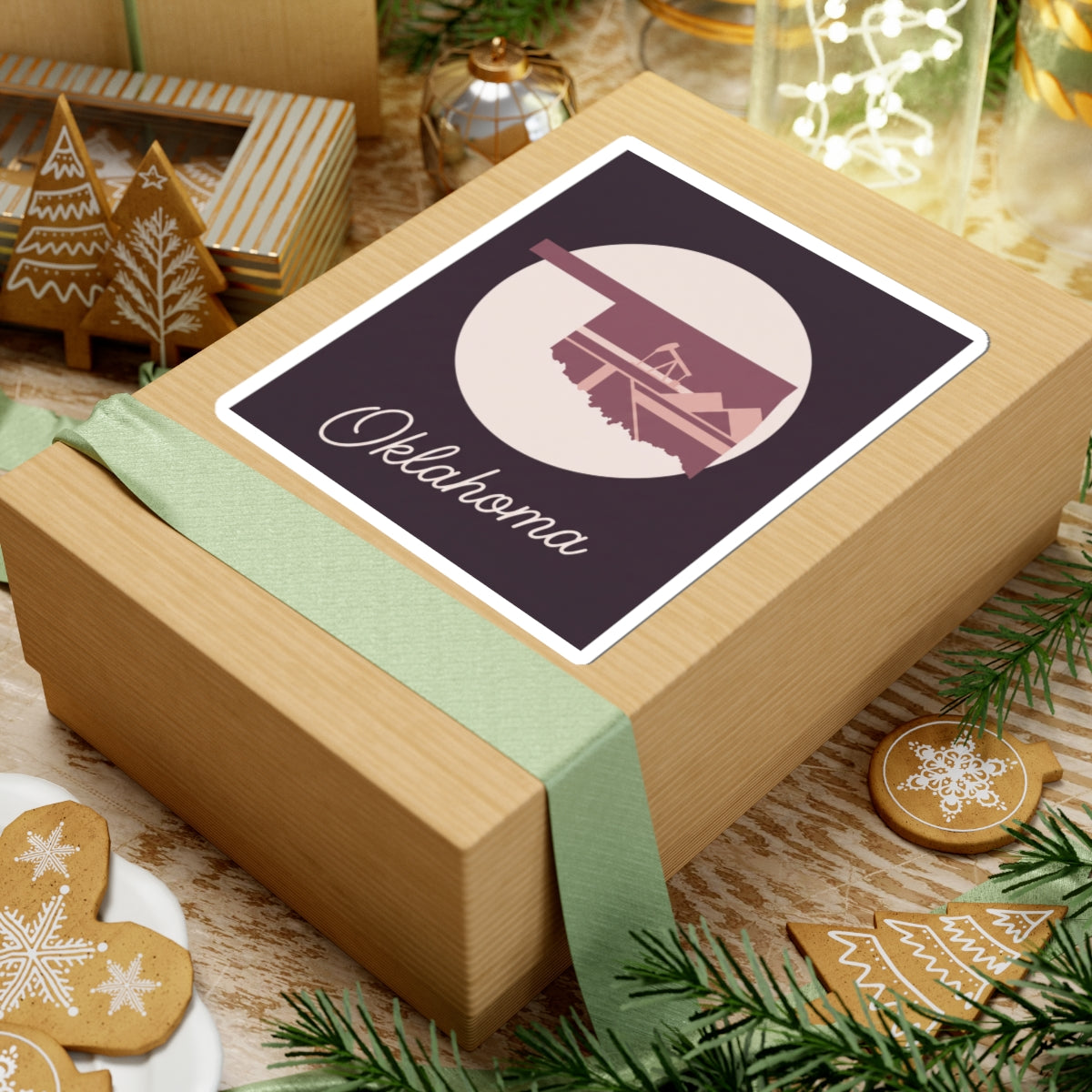 Oklahoma state sticker on gift: maroon square with oil derrick silhouette and Oklahoma script