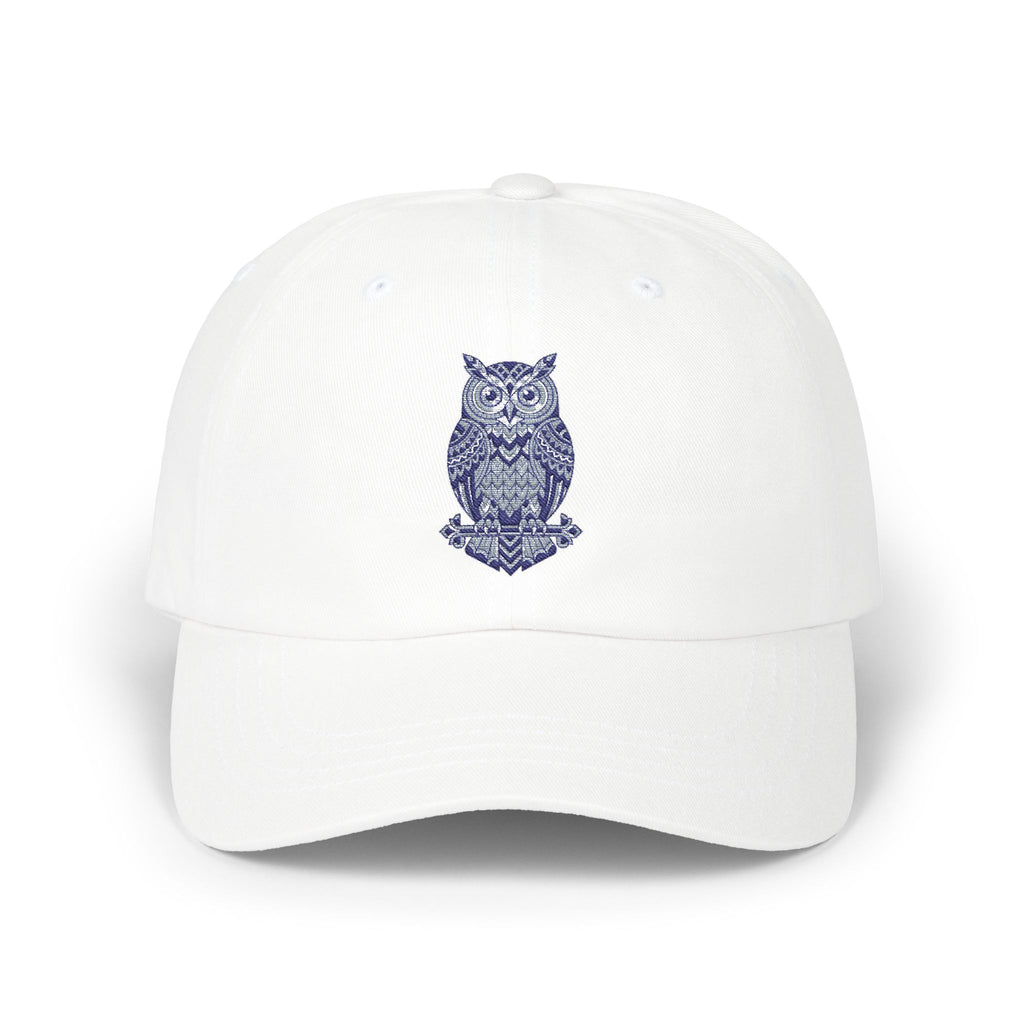 White owl-embroidered dad cap with curved brim and stitched crown vents