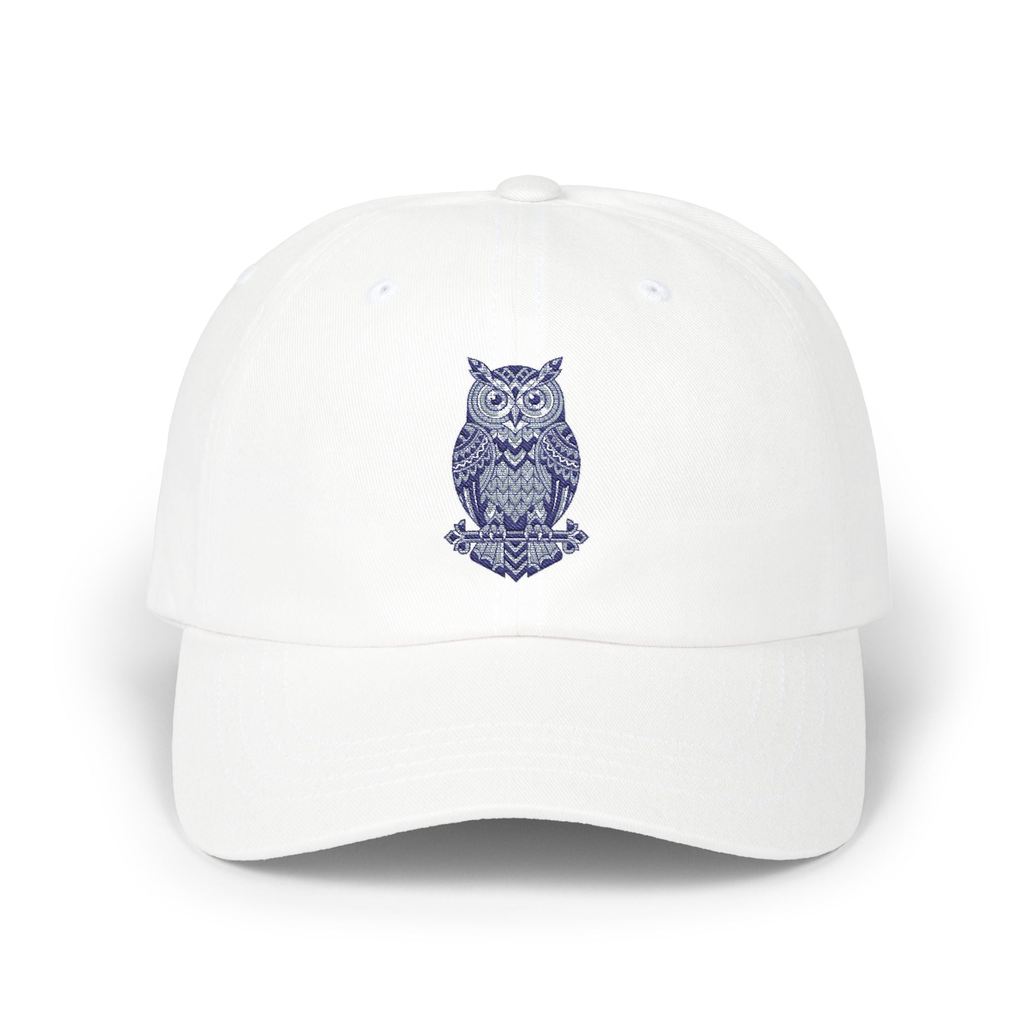 White owl-embroidered dad cap with curved brim and stitched crown vents