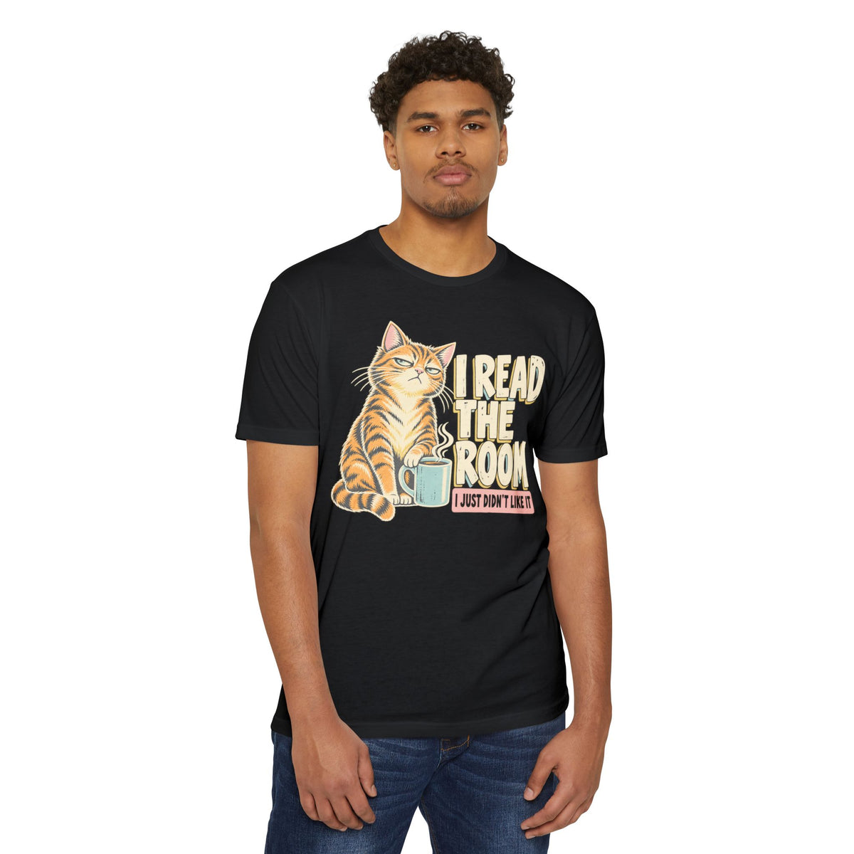 Black crewneck T-shirt with orange cat holding coffee mug and “I read the room” slogan
