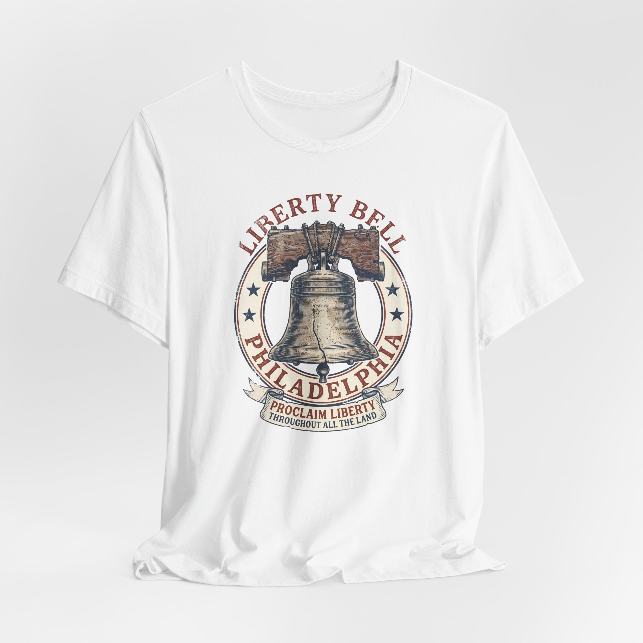 White crewneck T-shirt with centered Liberty Bell and text graphic