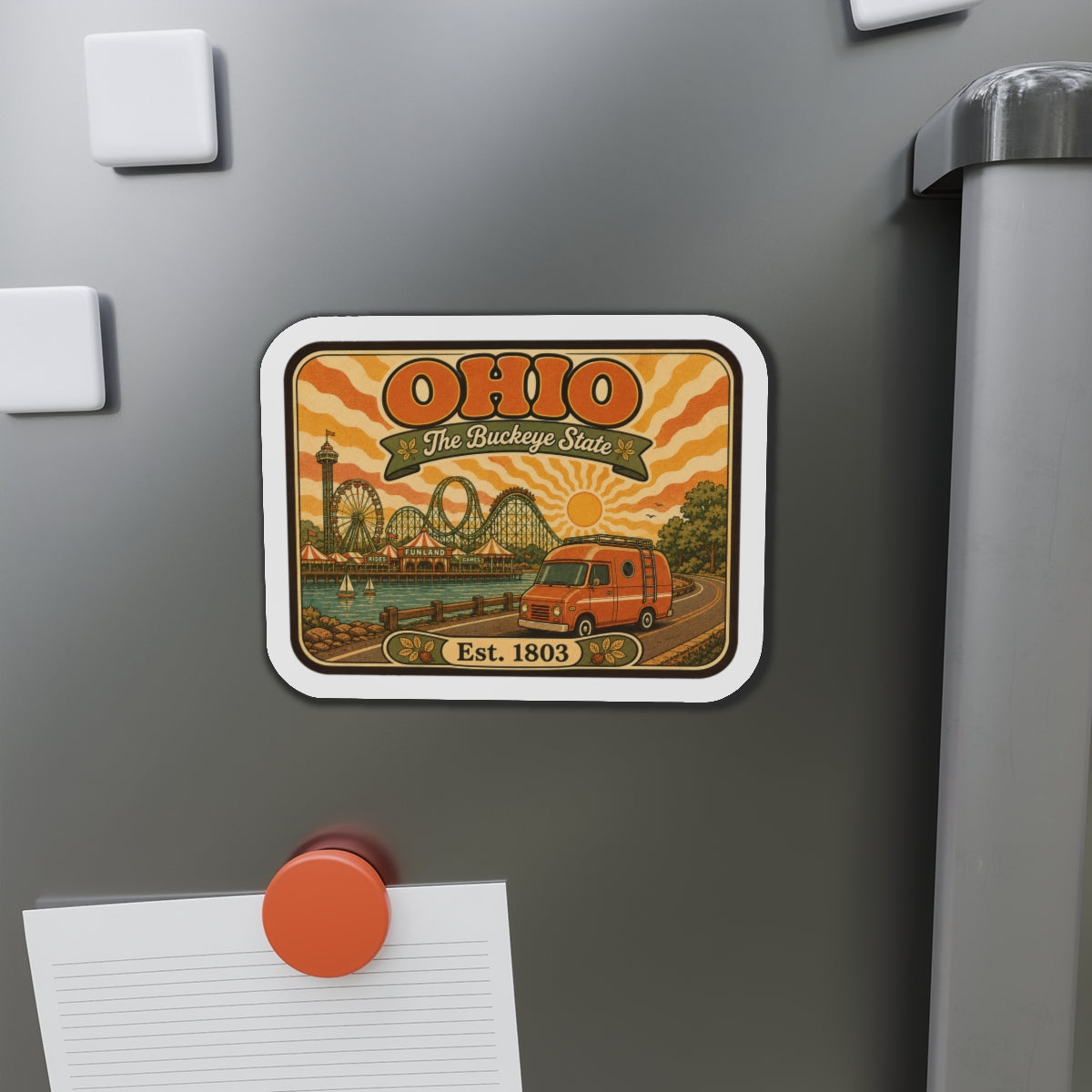 Ohio die-cut magnet featuring retro roller-coaster scene, orange bus, and "Est. 1803".