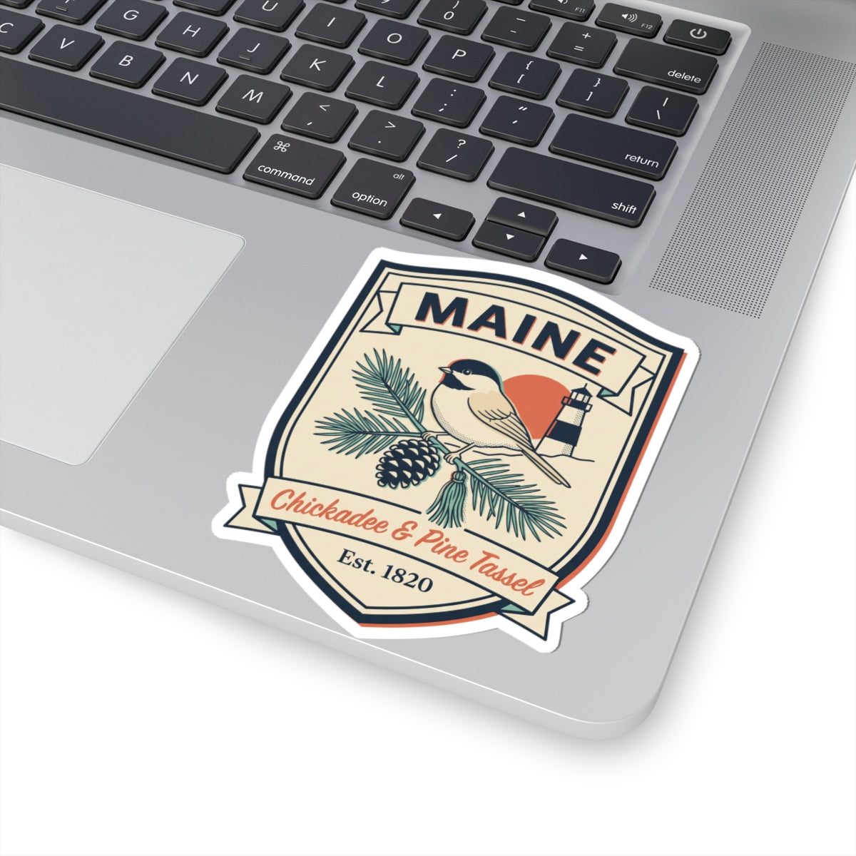 Maine state badge vinyl sticker with bird perch and lighthouse icon