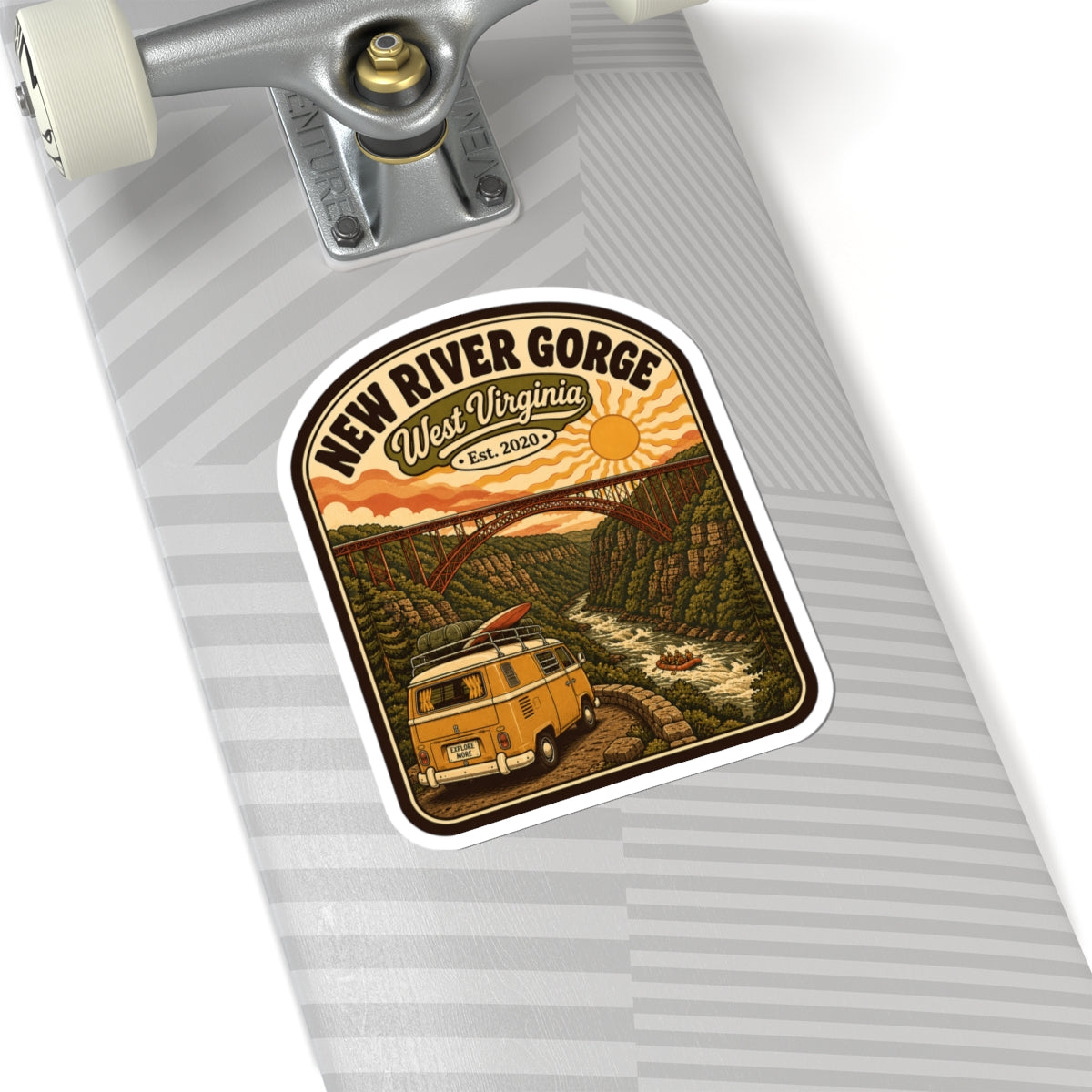 Rounded kiss-cut sticker on notebook, New River Gorge logo with yellow van