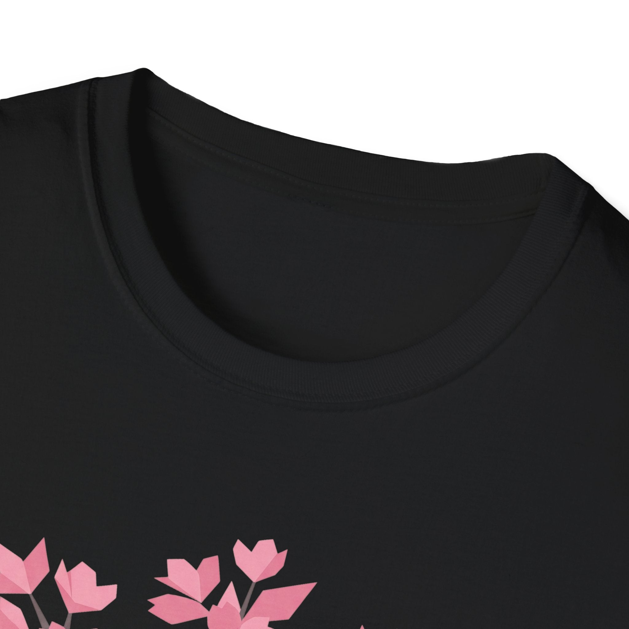 Black T-shirt neckline with partial pink cherry blossom graphic below.