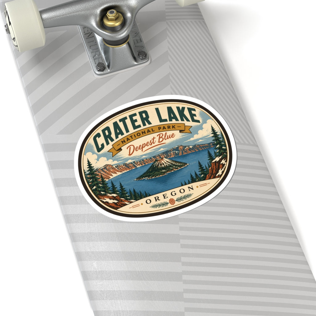 Round travel sticker on a skateboard deck showing Crater Lake “Deepest Blue” and “Oregon”.