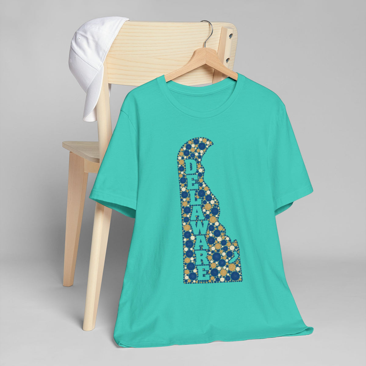 Teal Delaware silhouette graphic T-shirt with blue and gold mosaic pattern