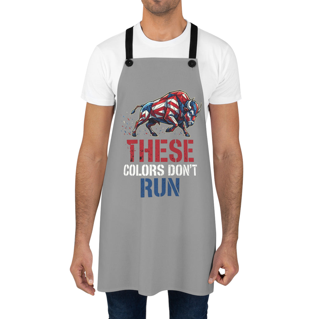 Gray grilling apron with black straps; bull graphic and “THESE COLORS DON’T RUN”