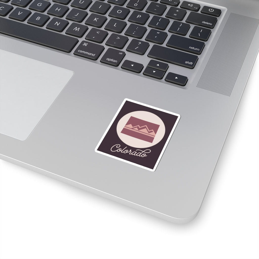Mauve Colorado state silhouette kiss-cut vinyl sticker on laptop